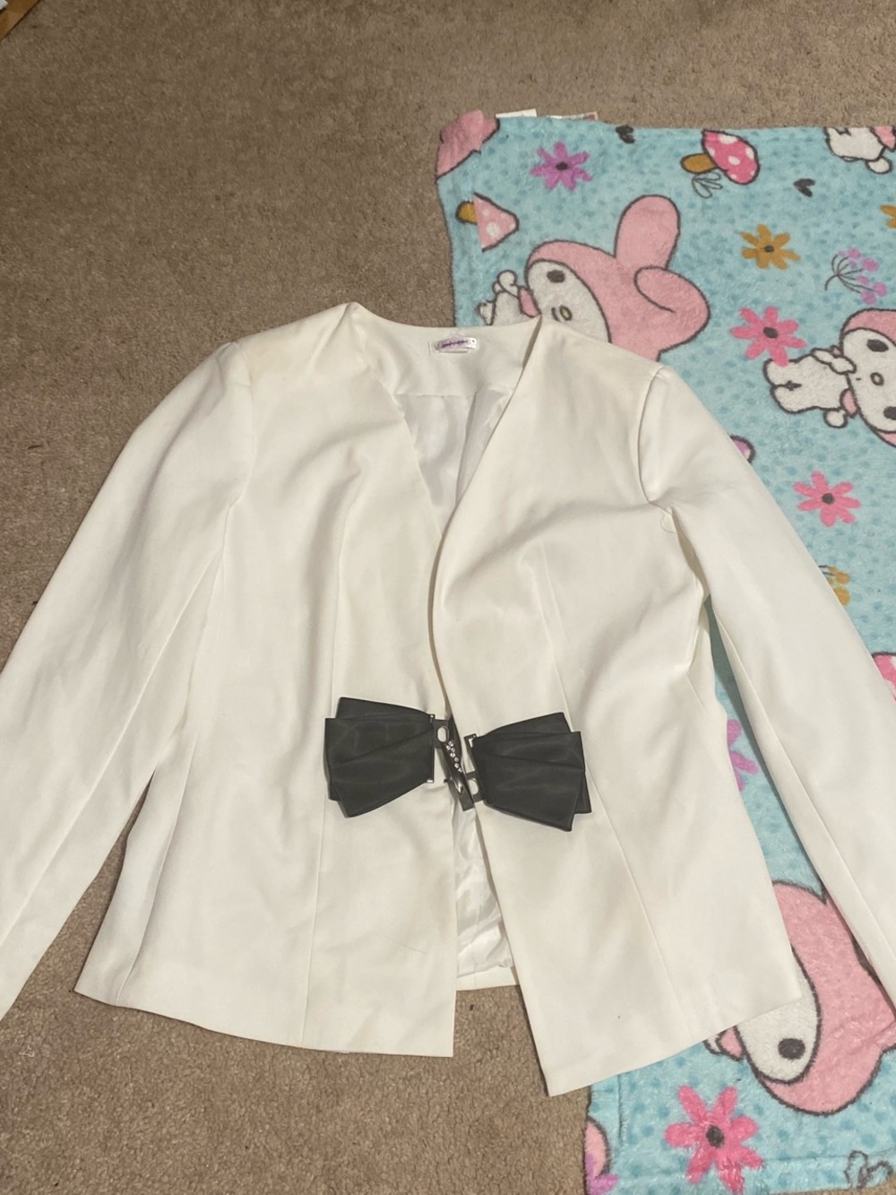 White Blazer with Black Bow Accent